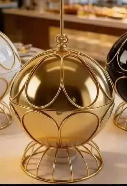 Golden fancy elegant chaffing dishes with hanging  lid view 2